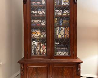 Antique Flame Mahogany Bookshelf / Cabinet. Measures 49" W x 18" D x 89" H. Photo 1 of 3.