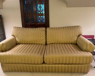 Two-Seat Upholstered Sofa. Measures 80" W x 36" D. Photo 1 of 3.