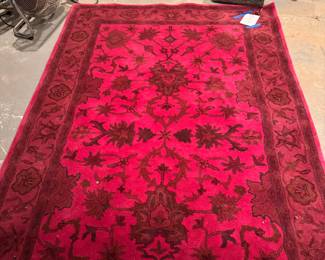 Magenta Persian Rug. Measures 5' x 9'. 