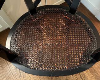 Set of 4 Ebonized Wood Arm Chairs with Cane Seats. Sourced From Winnetka's Material Possessions. Each Measures 25.5" W x 20" D with 18.5" Seat Height. Photo 4 of 5.