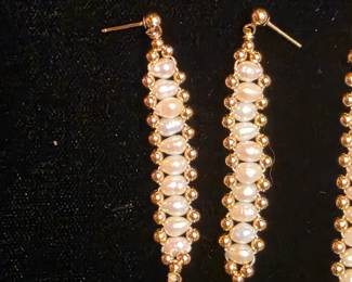 14K and Pearl set including earrings, bracelet, and necklace.