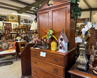 Antique desk with folk art items