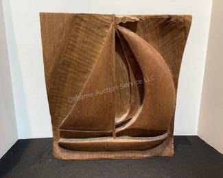 Carved wood sailboat plaque