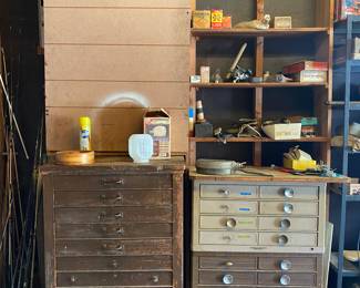 All of those metal and wood drawers are for sale, plus there are more in the shed in back yard.  All of those drawers are full of antique and vintage tools and hardware!