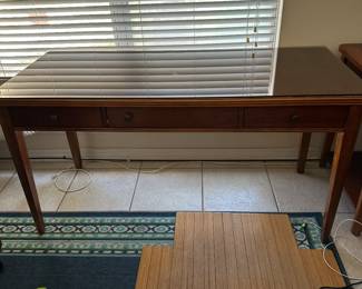 #50 - $180 - Wood desk inlaid with glass top 60x26x37 - 2 drawers 