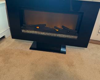 #47 - $100 - Electric fireplace 36x5x24 infrared two star international

