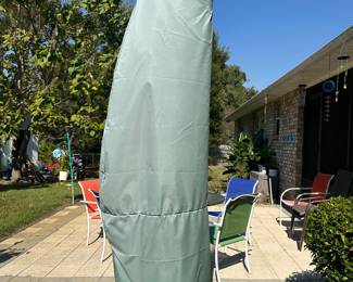 #56 - $ - Large umbrella on stand 
