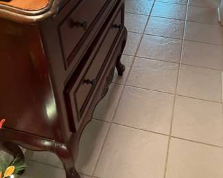 64 180.00 Two drawers chest brown top/red body & monkey feet 36Wx14Dx34H