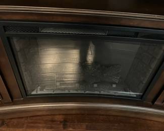 10 300.00 TV cabinet with built in fireplace 60Wx20Dx33H