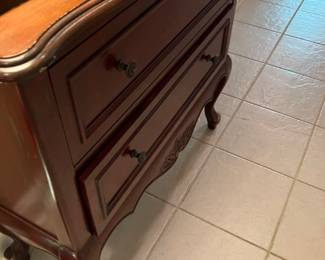 64 180.00 Two drawers chest brown top/red body & monkey feet 36Wx14Dx34H