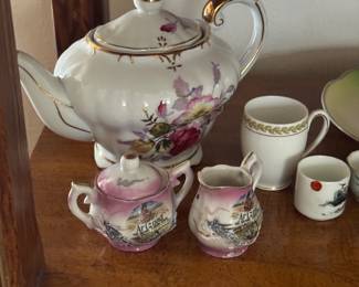 Teapot, tea cups and saucers