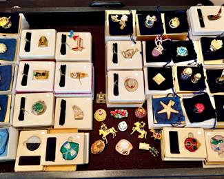 only one of the two cases of Estée Lauder compacts new in box.  