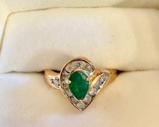14K EMERALD AND DIAMOND RING.