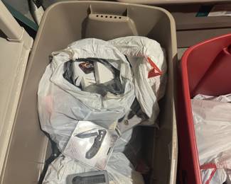 More knives! All those bags are full of them, as are the ones in the red tote.