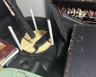 Guitar to the left of the trunk. Better picture will be here tomorrow!