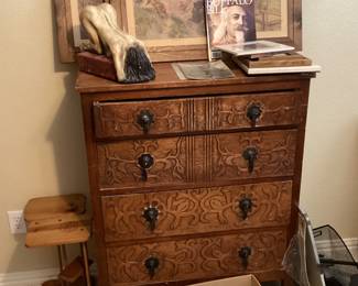 Hand carved tall boy dresser