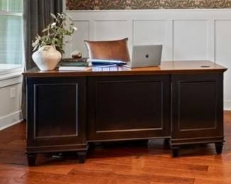 Solid wood black desk. Shown styled for the home listing. 