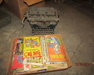 comic books and another typewriter