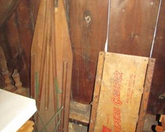 wooden ironing board and mechanics creeper