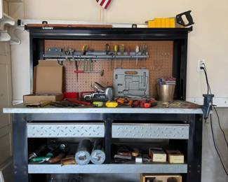 Sturdy Husky Workbench with Extensive Tool and Accessory Collection