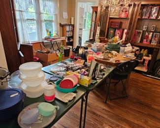 Kitchen Items like Tupperware (including loose lids); Tervis; Storage Containers; Pots & Pans; Ironing Board, Iron & Over-the-Door Hanger; Costume Jewelry, DVDs & VHS, Barbies, and furniture