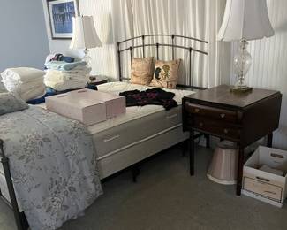 Queen bed, antique drop leaf side table, crystal lamps