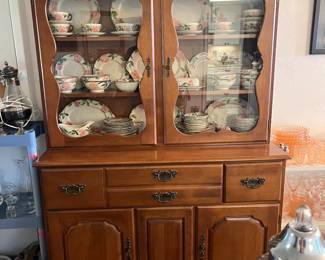 Maple hutch with collection of Desert Rose dishes