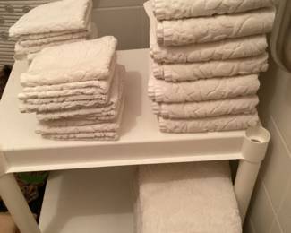 Set of white  towels, sheets and pillow cases
