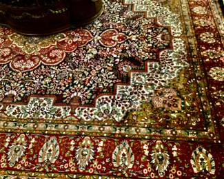 Beautiful silk rug with maroon accent