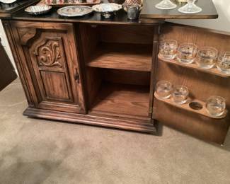 A buffet Storage with fold out Extension top