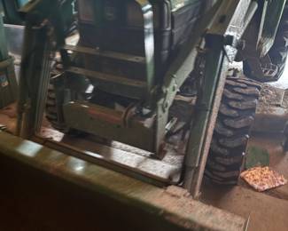 . . . barn find! -- a John Deere front-loading tractor