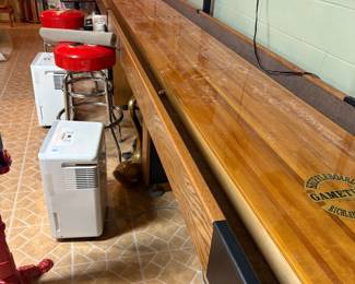 . . . a legal-sized shuffleboard game