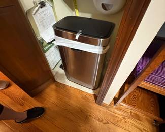 . . . stainless steel waste basket