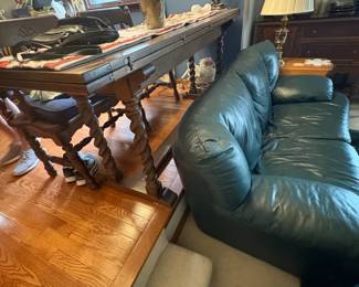 . . . green leather loveseat