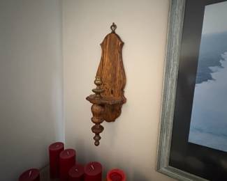 . . . close-up of sconce and candle collection