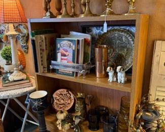 brass candlestick collection, vintage books and cook books