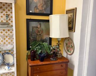 vintage framed art and wood furniture pieces