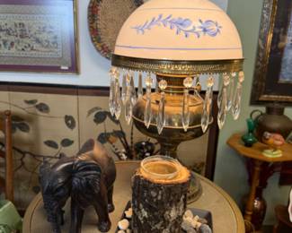 vintage lamp with hanging crystals, wood elephant figurine and more