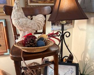 large rooster figurine, lamps, wooden chairs