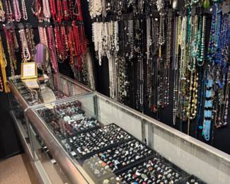 the jewelry room, lots of well organized beautiful rings, brooches, necklaces
