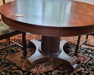 Round Pedestal Table with Two Leaves