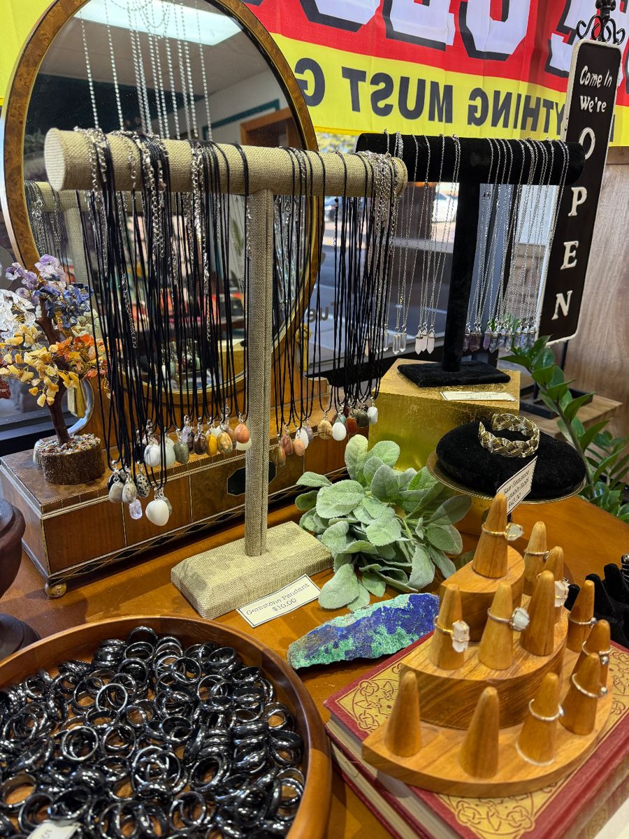 Gemstone pendants, Hematite rings and Crystal rings and necklaces.  (Vintage Mirror)