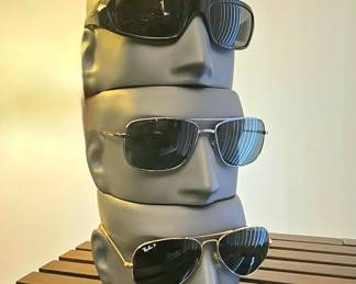 Ray-Ban and Fossil sunglasses.