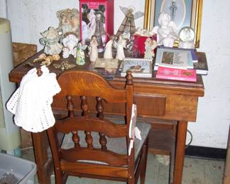 DESK TOPPED WITH ALL ANGEL STUFF