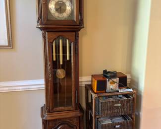 Grandfather Clock and CD player and Cds