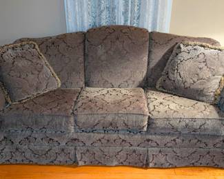 $200 Sofa by Kincaid Custom Upholstery
Label under seat cushion, circa 2008
With serpentine back, rollover arms, three seat cushions, two throw pillows; all in dark green floral damask patterned fabric.
Length: 84 in.; height: 35 ½ in.; seat height: 18 ¾ in.