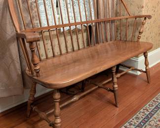 $100 Ethan Allen Maple Deacon’s Bench, from ‘The 1776 Collection’
In the Windsor style with arched spindle back, solid wood seat, turned legs joined by H-stretcher; underside with paper label for Ethan Allen and embossed “CA-5” and “18-6805”.
Length: 54 in.; depth: 21 in.; height: 38 in.