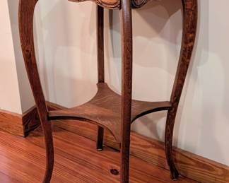 $35 American Art Nouveau Style Oak Square Side Table, Late 20th Century
The shaped top above carved apron raised on carved cabriole legs joined by lower shelf.
15 ¾ x 15 ¾ x 31 in.