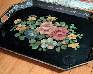$10 Toleware Tray, of rectangular form with canted corners, painted with sprays of pink, blue and yellow flowers.
22 x 16 x 1 in.