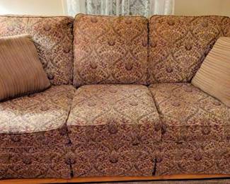 $150 Sofa by Craftmaster Furniture Co.
Label under seat cushion, circa 2008
With rectangular back, rollover arms, three seat cushions, two coordinating throw pillows; in tan and maroon floral paisley / damask pattern.
Length: 82 in.; height: 38 in.; depth: 40 in.